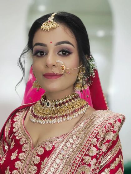 Another shot of this bride, showing how the makeup looks from a different angle. The contouring and highlighting define her features beautifully.