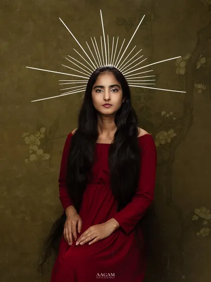 The Goddess. This conceptual portrait uses a simple crown of light to create a divine, ethereal effect, transforming the subject into a celestial being.