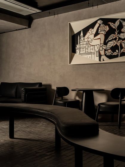 Another view of the coffee-themed canvas, showing how it anchors the seating area and enhances the overall customer experience.