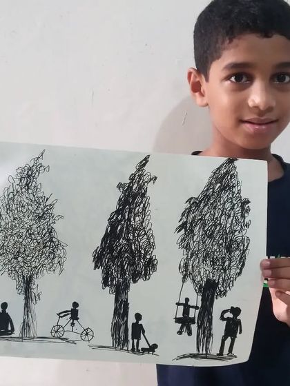 Prathul, a 2nd standard student, used a black sketch pen to create this striking piece of art. The drawing cleverly uses scribbling techniques for texture on the trees and simple silhouettes for the figures.