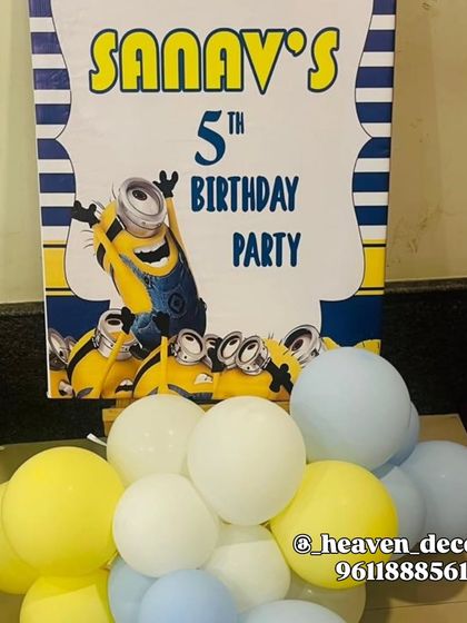A bold and fun welcome sign for a Minions-themed 5th birthday party. The sign features the classic Minions font and characters, setting the tone for the celebration right at the entrance.