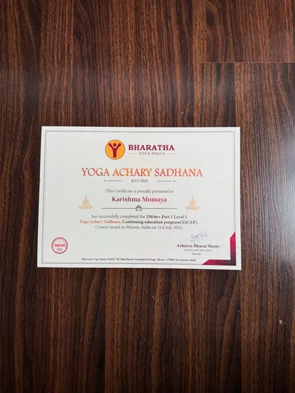 My Yoga Achary Sadhana certificate. This is not just a piece of paper; it's a responsibility to share what I've learned and guide every student into a more alive, joyful, and blissful version of themselves.