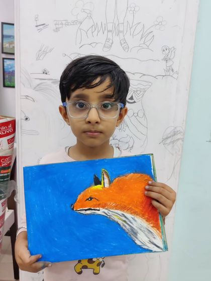 More images of our dedicated young artists at work and proudly displaying their creations.