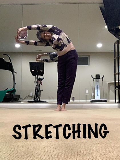 A standing side bend, or crescent moon pose, lengthens the waist and releases tension in the sides of the torso. It's a simple stretch that feels incredible.