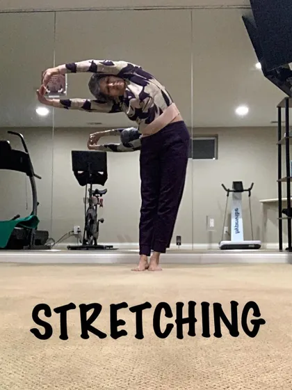 A standing side bend, or Ardha Chandrasana (crescent moon pose), without props. This simple stretch feels amazing along the waist and ribs.