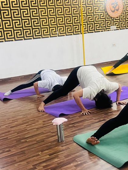 Working on hamstring and lower back flexibility with Prasarita Padottanasana, the wide-legged forward bend. This is a great pose to calm the mind.