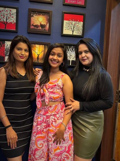 Guests posing for a photo against our stylishly decorated wall. Besides the main party area, there are several spots perfect for taking pictures.