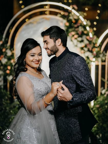 A candid and happy portrait of the couple during their engagement celebration.