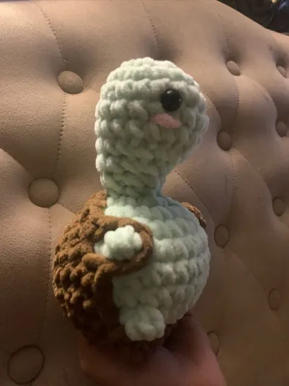 Meet Tabby the Turtle! This amigurumi was made with a thick, plush yarn for maximum softness and features cute little blush details.