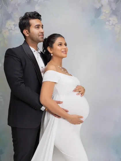 A beautiful formal portrait of the couple, looking towards their future. The classic black tux and white gown create a timeless look.