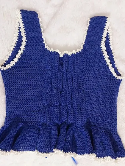 A close-up of the ruched back panel on the Olivia Top, a detail that provides excellent fit and comfort.