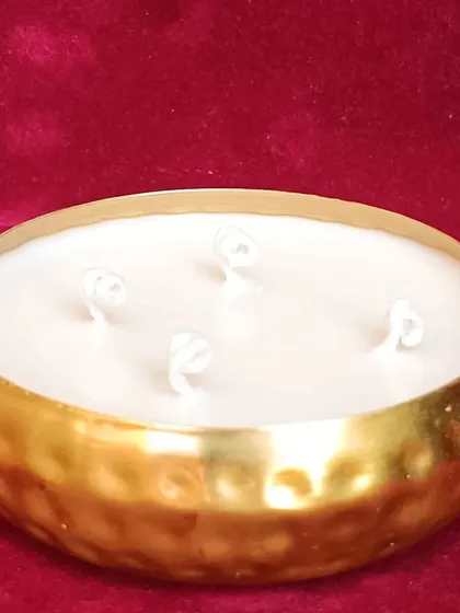 The hammered golden urli candle, a versatile piece for any festive hamper.