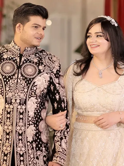 Another shot of the couple walking together, looking perfectly coordinated and in love.