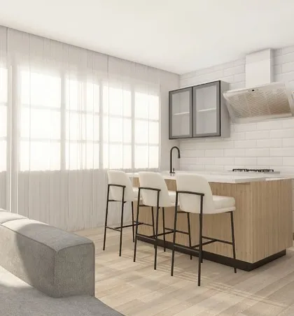 Another view of the open kitchen and living area. The large windows allow for plenty of natural light, which is a key element of Scandinavian design.