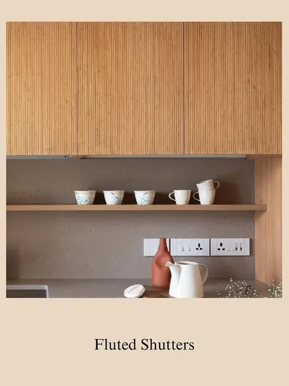 Fluted shutters add a fun yet minimalistic touch to any kitchen. The texture provides visual interest without overwhelming the design, making it a versatile choice for many different styles.