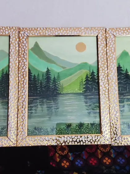 Another angle of my framed "The Divine Nature" triptych. The textured gold frame complements the green and earthy tones of the landscape paintings.