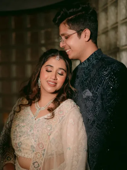 A quiet moment between the happy couple. Her makeup was designed to be soft and radiant, with a gentle shimmer on the eyes that catches the light beautifully.