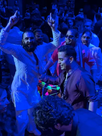 A sangeet night turned into a Bollywood set with the one and only Ranveer Singh. We were thrilled to share the stage and match his incredible energy.