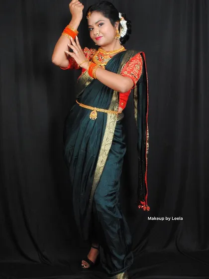 Showcasing my versatility with a traditional Marathi look. This style includes a unique saree drape, a classic Maharashtrian nose ring (nath), and makeup that honors cultural traditions.