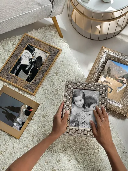 I believe in celebrating bonds. For Raksha Bandhan, I curated this collection of photo frames to hold your most cherished sibling memories. Each frame, from snakeskin textures to hammered silver, is designed to be as unique as your relationship.