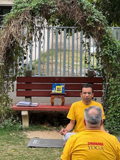 A new teacher leads his first meditation session with a fellow student. Our course provides a safe space to build teaching confidence.