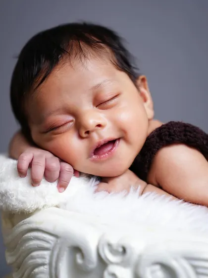 The sweetest sleepy smile from a newborn during their session. These are the magical, unscripted moments I live for.