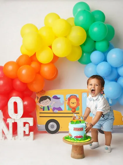 Yes, it gets messy, and yes, it's absolutely worth it! A cake smash session is pure, unfiltered joy. I love capturing the moment a child discovers cake for the first time, resulting in photos filled with laughter and delightful chaos.