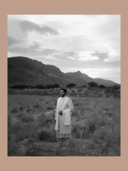 A timeless black and white portrait of the groom in the open landscape. Monochrome adds a classic, artistic feel to the image.