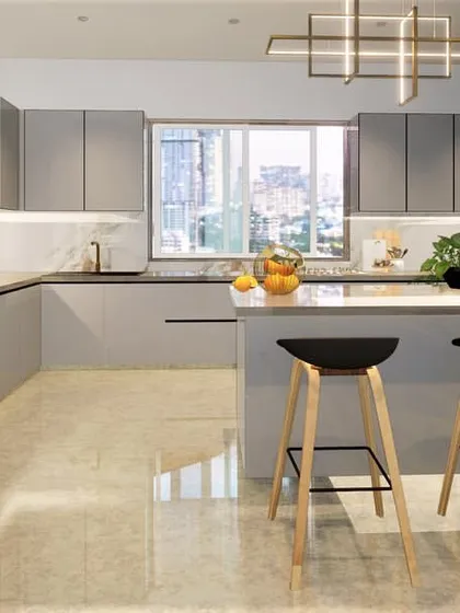 This angle highlights the clean, uninterrupted lines of the handleless cabinetry and the spacious layout. The large window allows natural light to flood the space, enhancing the serene and minimalist atmosphere.