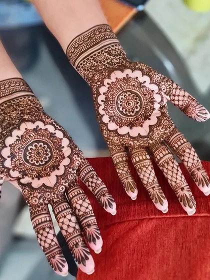 A classic floral mandala design that is always a popular choice for its timeless beauty.