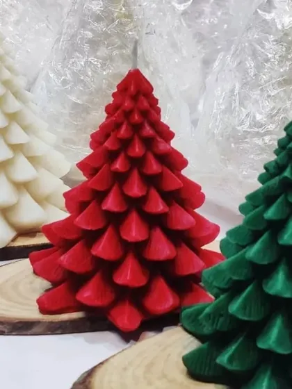 My Christmas tree pillar candles are perfect for holiday decor. Available in festive red, green, and white, these detailed candles bring the spirit of a winter forest into your home.