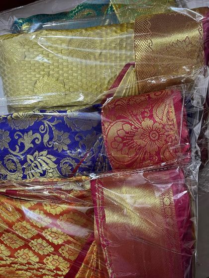 A colorful collection of packed sarees. This is a great way to see how organized your wardrobe could be.