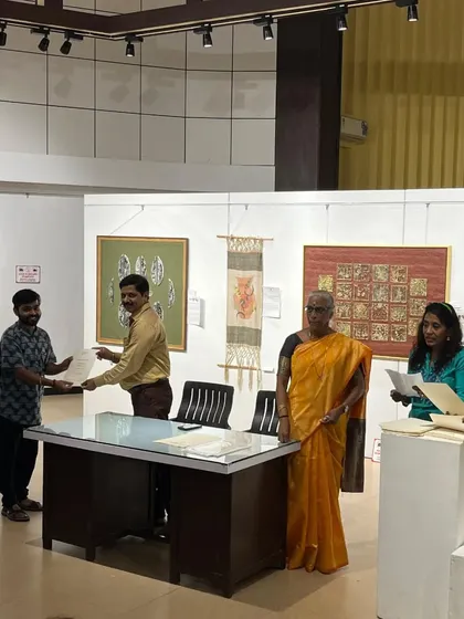 Receiving a certificate at the 44th Monsoon Show at Jehangir Art Gallery.