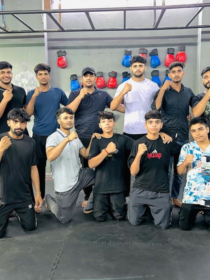 "Boys on fire." The team is hyped and ready before heading to the kickboxing state championship.