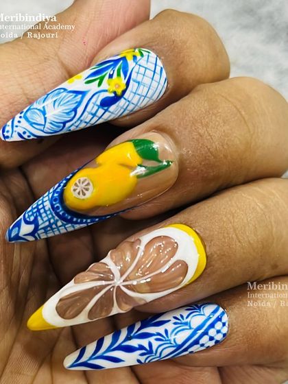 A different perspective of the summer fruit nail art, showing the 3D encapsulated lemon slice. This technique adds depth and a realistic touch to your designs.