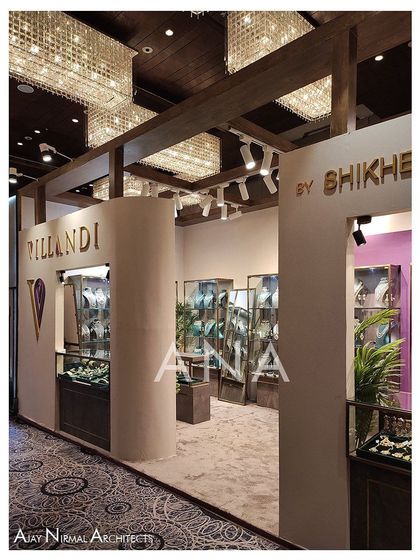 This angle shows how the floating roof structure of the Villandi '22 stall was supported by wooden members, creating an open and airy feeling despite being in a hotel ballroom.