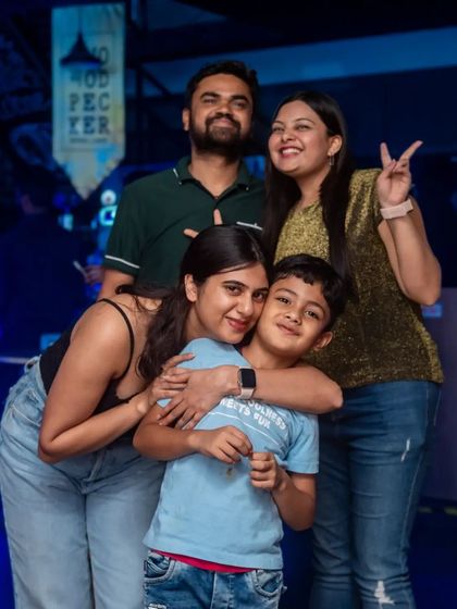A happy family photo from a night out at the pub. I welcome families and provide an environment where everyone can have fun.