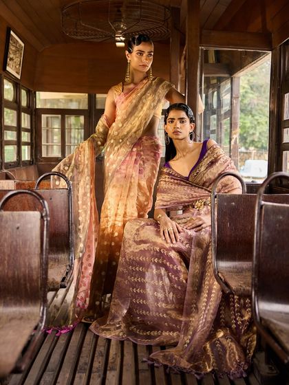 The Resa By Ushnakmals collection celebrates the art of handwoven textiles. These sarees, with their rich textures and contemporary color palettes, resonate with both history and innovation, perfect for the discerning woman.