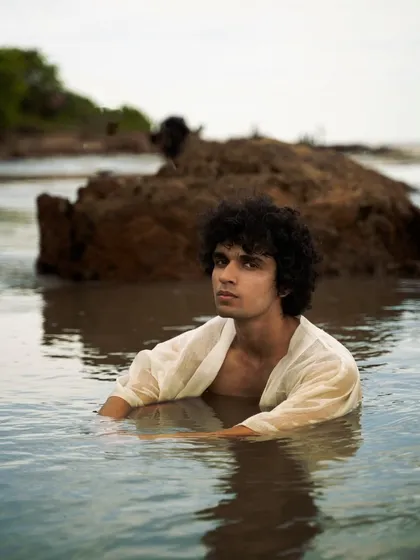 For me, a powerful portrait is about capturing an authentic emotion. This shot from a men's portfolio session at the beach uses the natural environment and soft light to create a raw, editorial image that feels both strong and vulnerable.