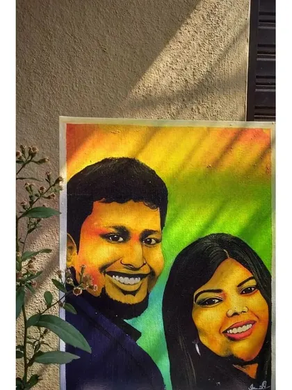 A custom couple's portrait painted on canvas, capturing a moment of shared joy. My goal with portraits is to go beyond a simple likeness and paint the unique connection and personality of the people involved. This expressive style uses vibrant colors to bring the subjects to life.