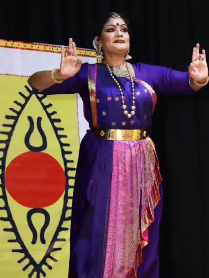 Performing for students is always a special experience. This image captures a moment of peace and balance during my SPICMACAY presentation, with their distinctive and beautiful backdrop.
