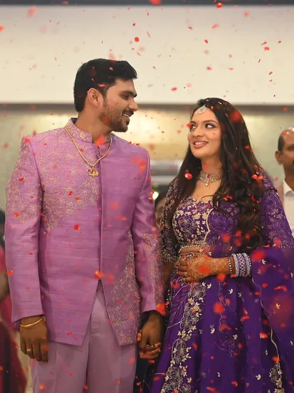 For this beautiful reception, we went with a glamorous yet elegant look. The soft waves and radiant makeup perfectly matched her stunning purple lehenga, creating a memorable style for her special evening.