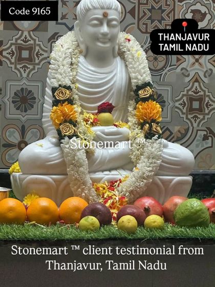 Another beautiful shot of the decorated Buddha idol from our Thanjavur client. The intricate carving and serene expression are highlighted here.