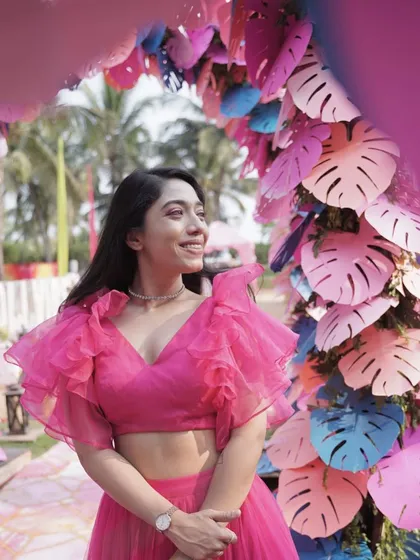 Beauty is being the best possible version of yourself on the inside and out. A candid smile in a beautiful pink outfit.