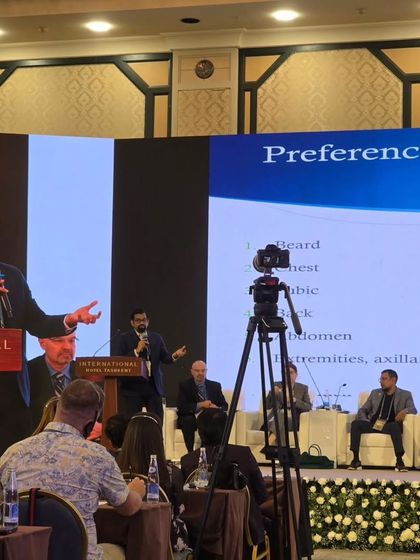 Speaking at the podium during LAHRC 2025. These events are a great platform for academic exchange and networking with peers.