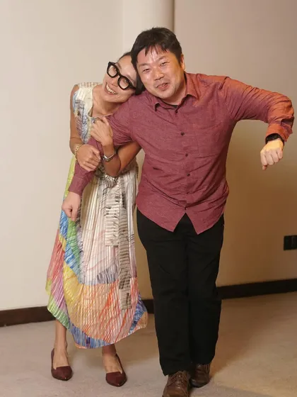 Another photo from the same playful series, showing a different, equally joyful interaction. I love capturing the unique personalities of your guests in every frame.