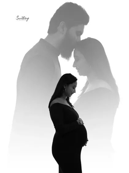 A beautiful double exposure portrait in black and white. It combines a solo shot of the mother-to-be with an intimate couple's embrace, telling a story of love and self-reflection.