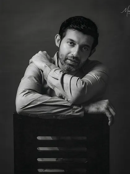 A professional black and white portrait. This captures the more serious, artistic side of my personality.