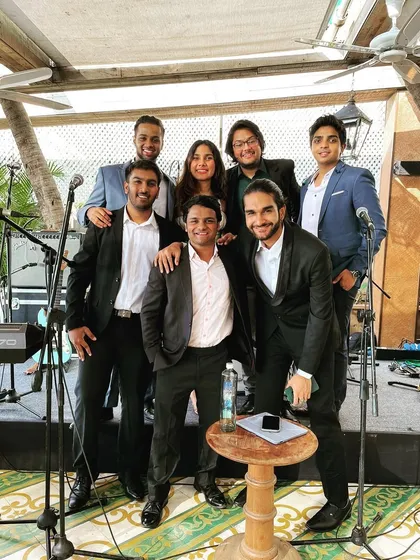 The whole crew together after a fantastic gig. We started as friends and that's how we operate, bringing a genuine, close-knit energy to every performance.