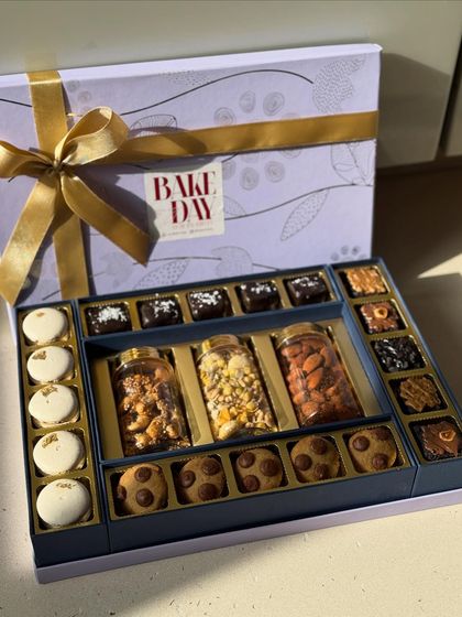 The Ultimate Sweet Treat Hamper for Diwali, featuring a luxurious assortment of macarons, cookies, brownies, and three jars of our signature dry fruits.